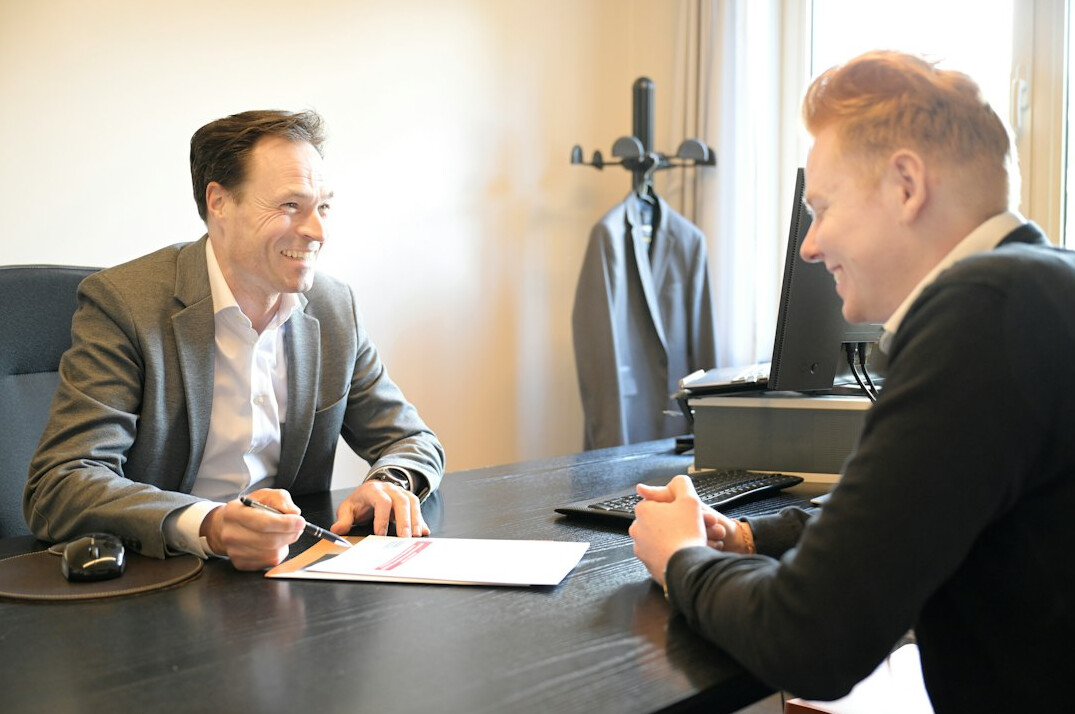 happy client with insurance agent